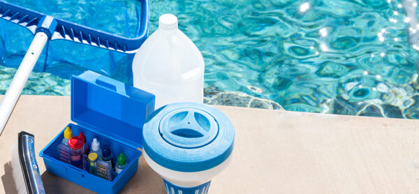 Pool cleaning supplies near pool